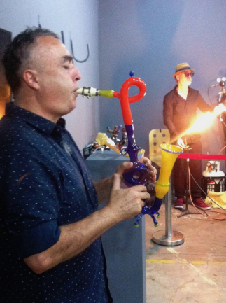 Blowing a glass instrument